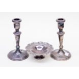A pair of 20th Century silver candle sticks and silver 20th Century pin dish,