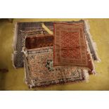 A Bokhara design cotton fringed and bordered rug,