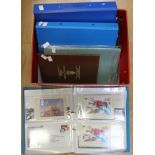 Two blue vinyl ring binders containing large quantity of Royal Mint decimal stamps, Mint packs,