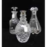 Silver mounted decanter and two other plain decanters