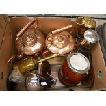 Two E Thomas & Williams presentation miners lamps together with two copper kettles,