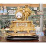 A late 19th Century French gilt metal and onyx bracket clock,