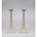 Pair of Royal Worcester ivory coloured candle sticks A/F