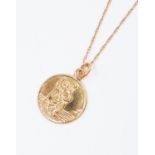 A 9ct gold St Christopher and chain, total gross weight approx 8.