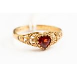 A 9ct and garnet heart-shaped ring, size Q½, gross weight approx 2.