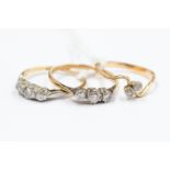 Two 18ct gold and diamond three-stone rings, total gross weight approx 3.