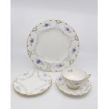 A four piece Royal Crown Derby Delphine set; plate, side plate, cup and saucer,