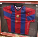 A signed, framed and glazed Barcelona home shirt, Patrick Kluivert and Frank De Boer,