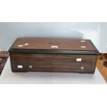 A 19th Century music box with eight different musical themes, French design, mahogany box,
