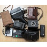 A collection of assorted cameras including Warwick box camera, Bell and Howell Super 8,