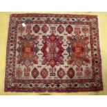 A small Caucasian cream ground Kasak design mat with three banded border,