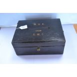 A black leather gentleman's travel writing box,