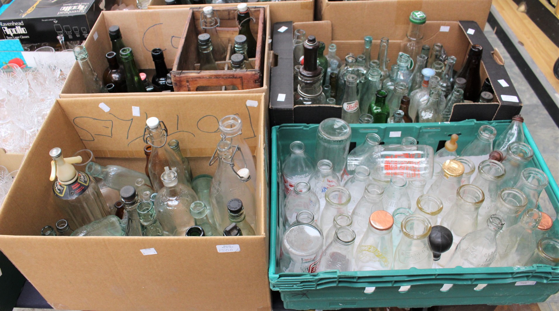 Large collection of glass bottles to include; milk bottles, Castrol, poison bottles,