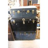 Three large travelling trunks, one London 'Moss Man',