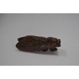 A cicada treen netsuke,