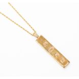 A 9ct gold ingot necklace on a fine link chain, length approx 20'', total gross weight approx 24.