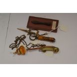 Collection of small items, ships whistle, Roman arrow head, cork screw,
