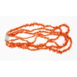 A good quality graduated four string coral necklace,