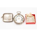 A Victorian silver pocket watch, Birmingham 1898 and silver match striker,