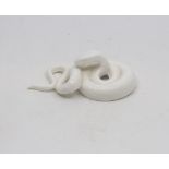 A unmarked Royal Worcester netsuke modelled as a coiled snake,