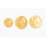 Two Arabic gold coins, in the form of sovereigns, stamped 21K and another smaller,
