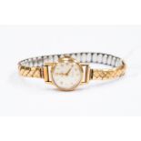 A ladies Rolex 9ct gold watch on later plated expander strap,
