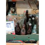 A collection of brewery ephemera, including bottles, glasses, Babycham figures, menus, ashtrays,