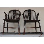A near pair of 19th Century Oak Windsor Chairs.