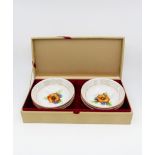 A Japanese set; dessert bowls with forks,