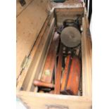 A chest of assorted interesting tools, grinder, large screwdrivers, a steel Barb, hand forged,