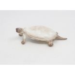 A Royal Worcester netsuke modelled as a tortoise, green stamp & numbered 2604, dated circa 1918,