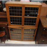 A mid 20th Century oak two tier bookcase,