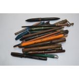 A collection of pencils, fountain pens,