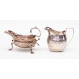 A George III silver sauce boat, ogee rim on three trefoil pad feet, London 1761,