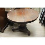 Early 19th Century mahogany round tilt top pedestal breakfast table.