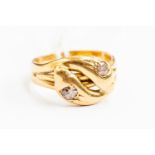 A Victoria 18ct gold and diamond snake head twist ring, size O, total gross weight approx 6.