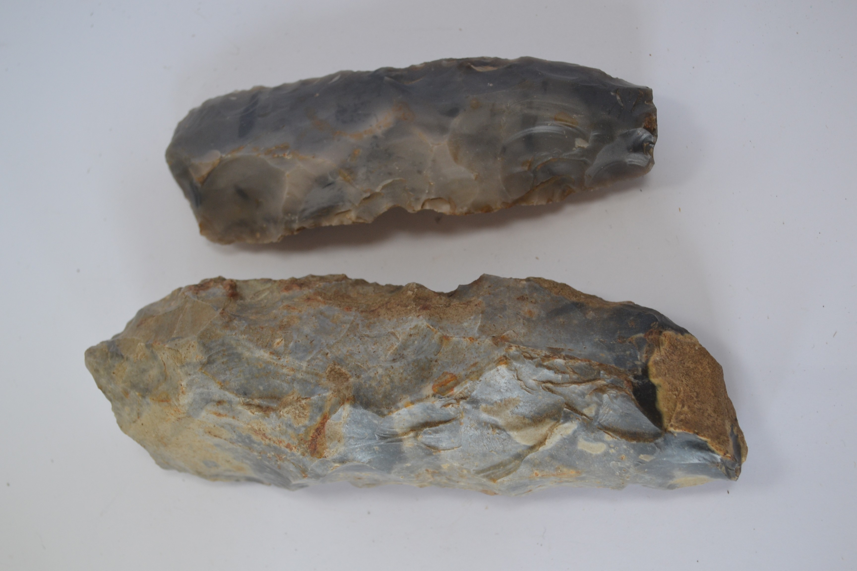 Two Prehistoric Flint Axeheads, A mesolithic tranchet axe/adze circa 9000-4000 BC,