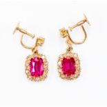 A pair of synthetic ruby and diamond cushion shaped drop cluster yellow gold earrings,