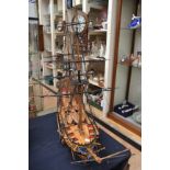 Model of a ship on stand,
