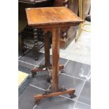 An early 19th Century mahogany wine table with turned stretcher (af)