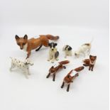 Collection of four fox and four dogs including Beswick (8)