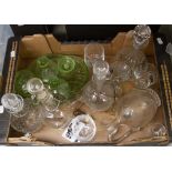 A collection of glassware including five various decanters, four with silver plated labels,