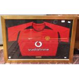 A signed, framed and glazed Manchester United home shirt, David Beckham,