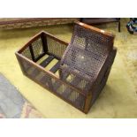 A late Victorian mahogany cradle frame, with canework sides, 81cm high, 88cm wide,