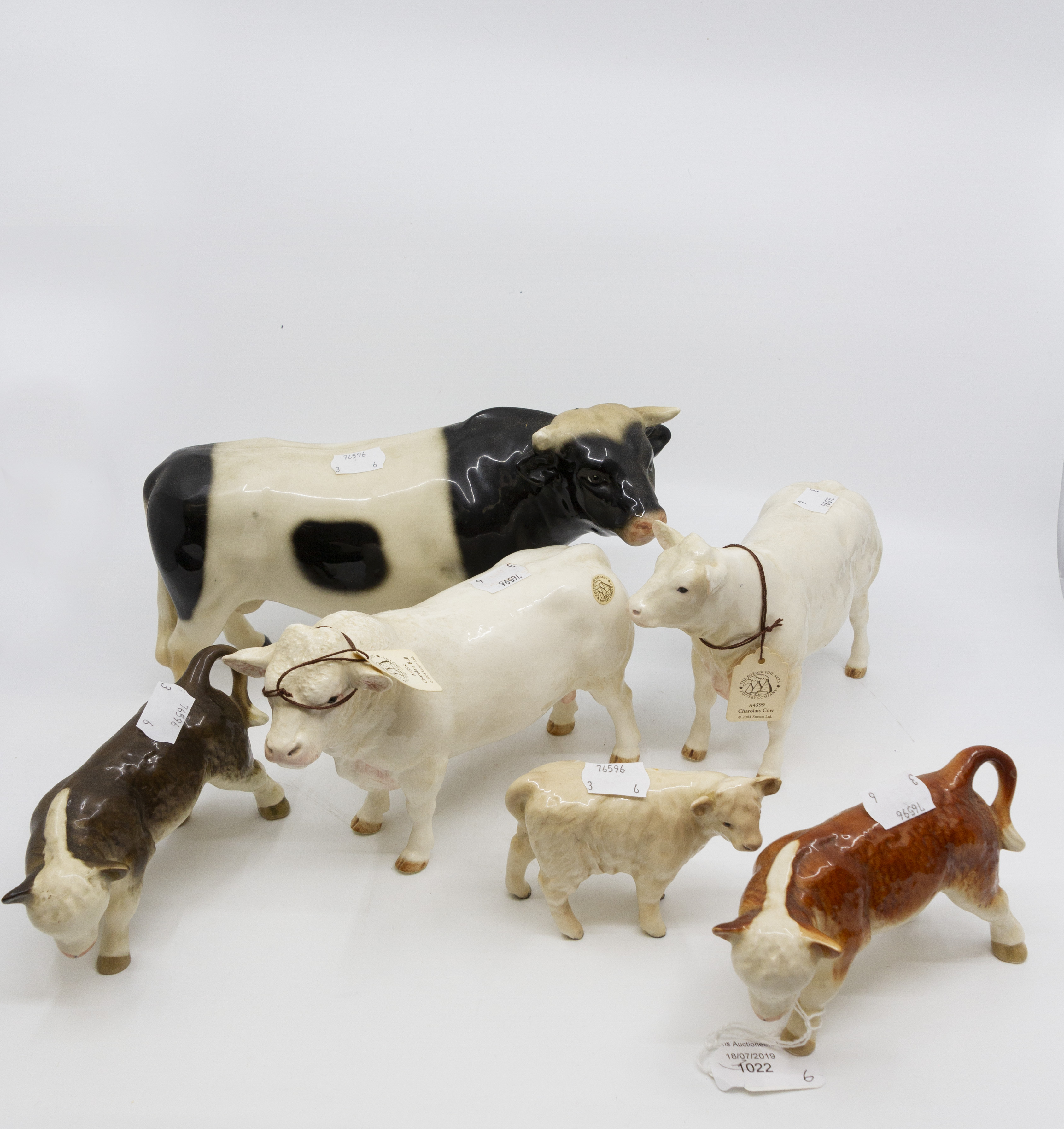 Six bulls including two Border Fine Arts and one Beswick calf