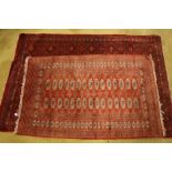Two red ground Persian rugs,