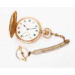 A Dennison gold plated hunter pocket watch, white enamel dial, Roman numerals,