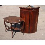 A 19th Century mahogany bow fronted hanging corner cupboard, 105cm high,