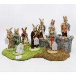 Royal Doulton Bunnykins The Robin Hood collection comprising; base, Robin Hood, Maid Marian,