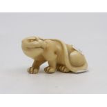 A Royal Worcester blush ivory netsuke modelled as a Tiger, 7.